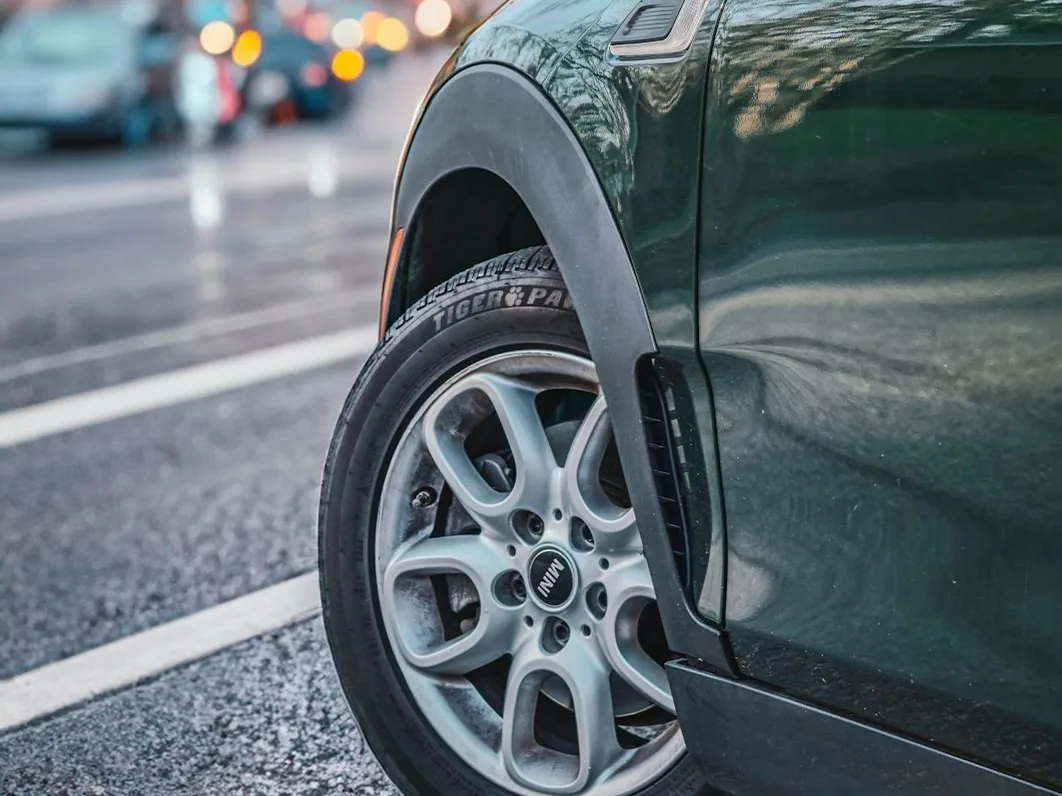a wheel job on a car out on the street (Gosport)