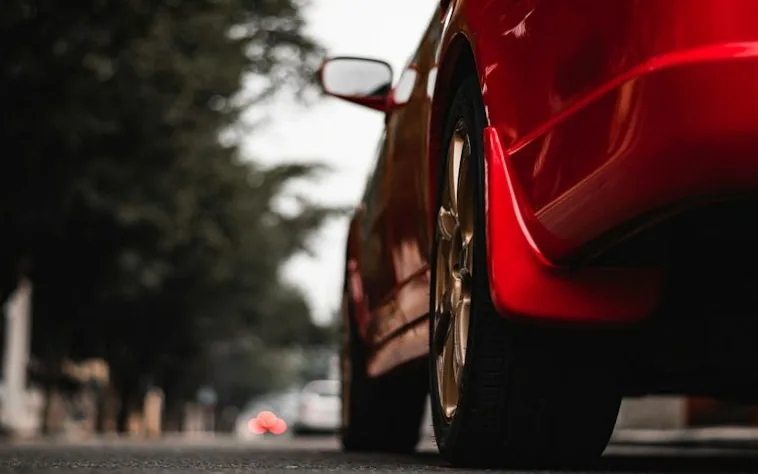 a wheel on a car, photographed square-on