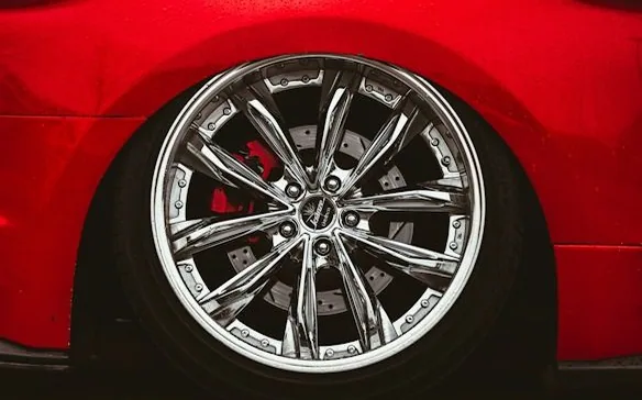 finished wheel on a red car