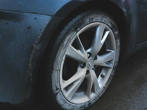 a scuffed wheel photographed for a quote