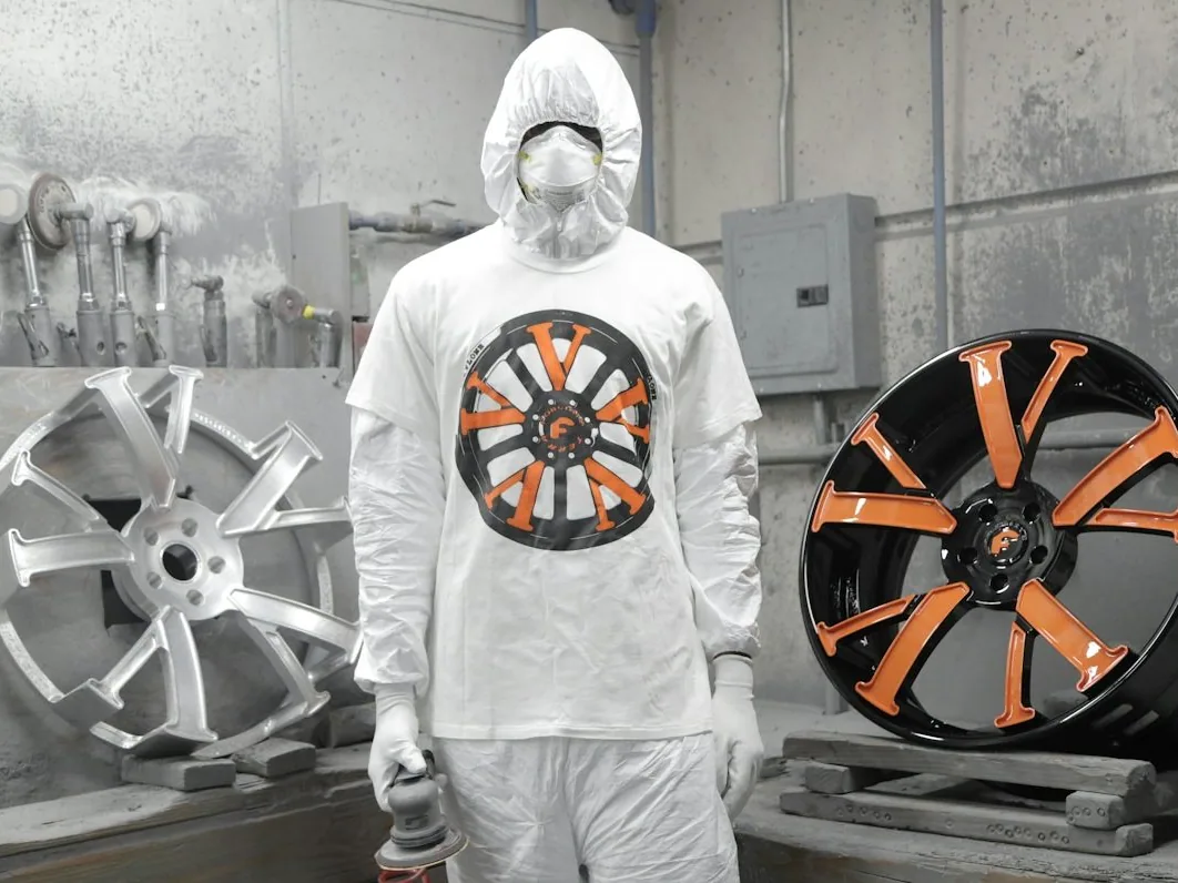 a wheel stripped to bare alloy