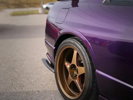 a car on coloured wheels